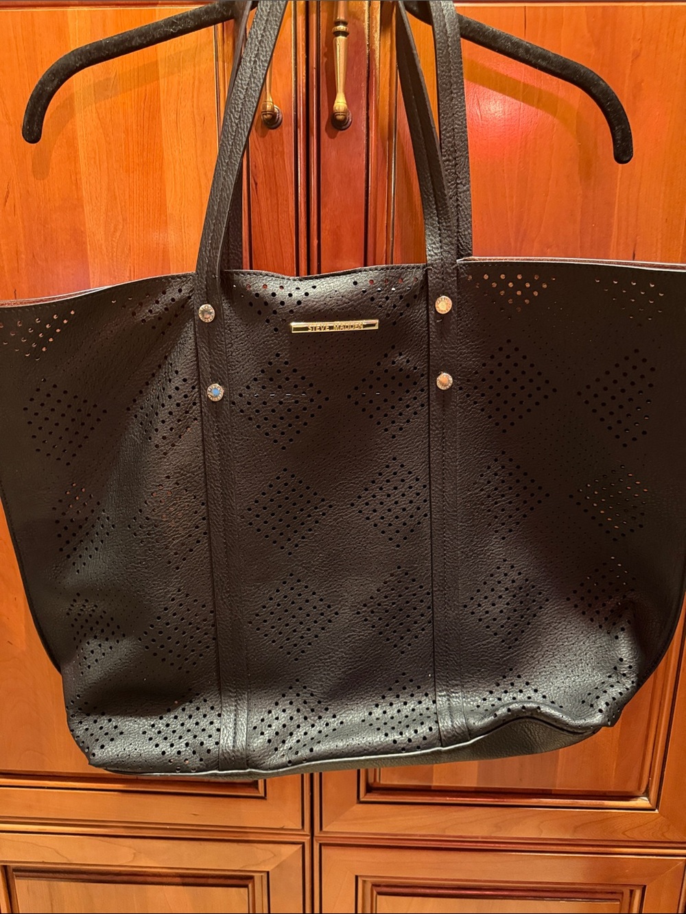 Steve Madden Black Perforated vegan Leather Tote with Gold Plaque